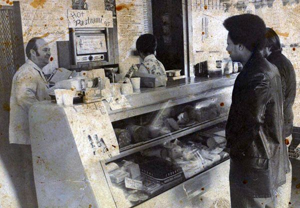 1975 Joe Nardelli (2nd generation) waits on a customer in the South Main Street store. 